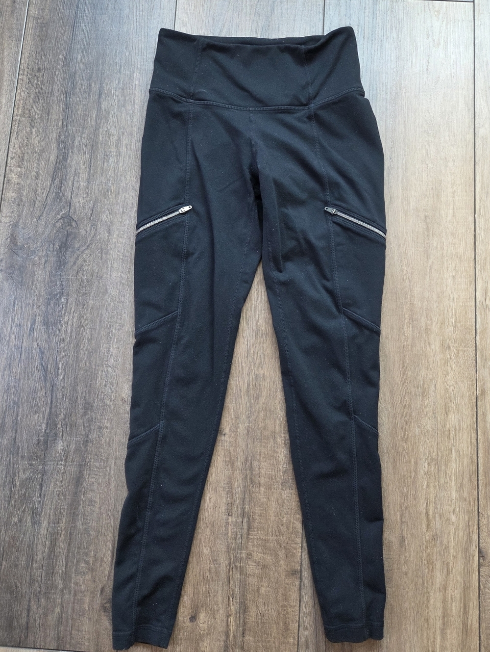 Athleta Black High-Rise Leggings with Zip Pocket Detail